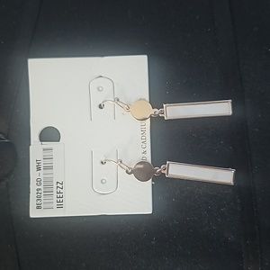 White and gold dangling earrings